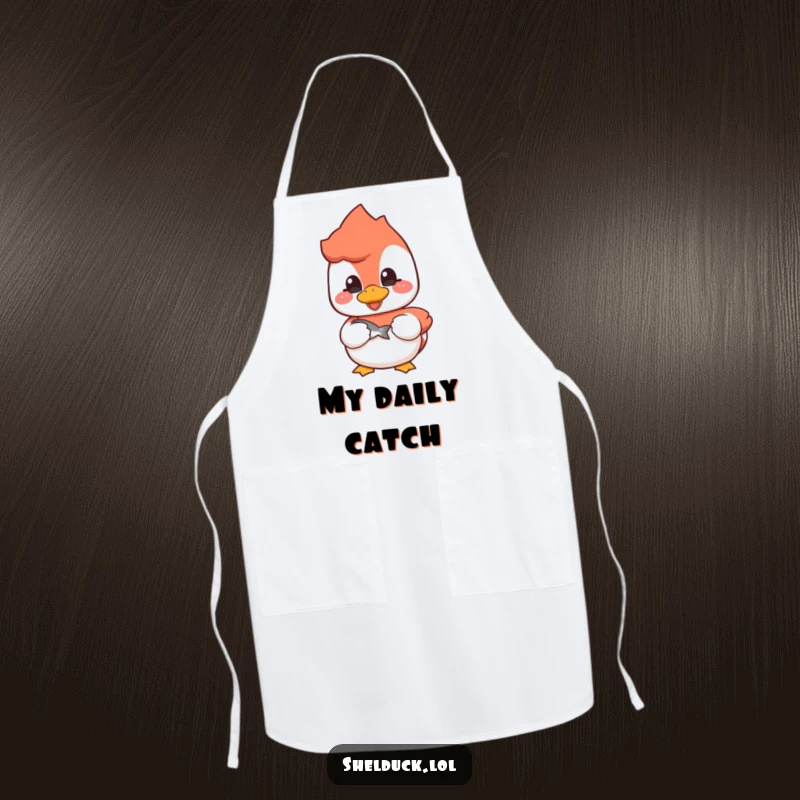 Funny shelduck apron featuring a cheerful bird holding a fish, ideal for cooking and grilling.