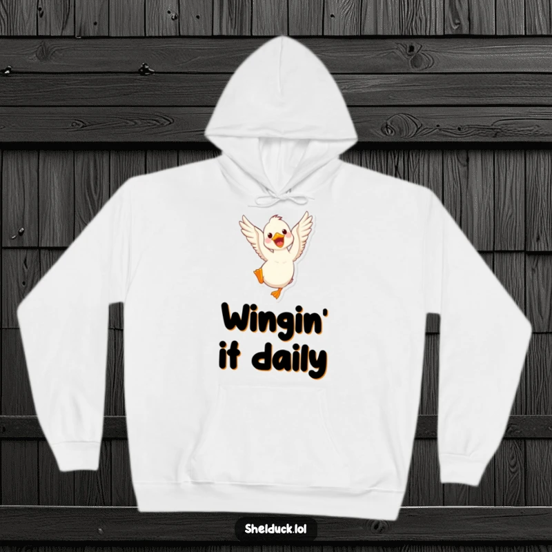 Funny shelduck hoodie featuring a cute character vigorously flapping its wings, perfect for staying warm and cheerful