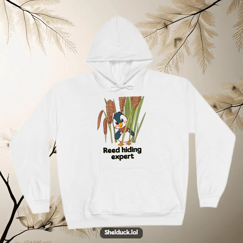 Funny shelduck hoodie showing a comical bird peeking from behind a reed, perfect for staying warm with a touch of humor.