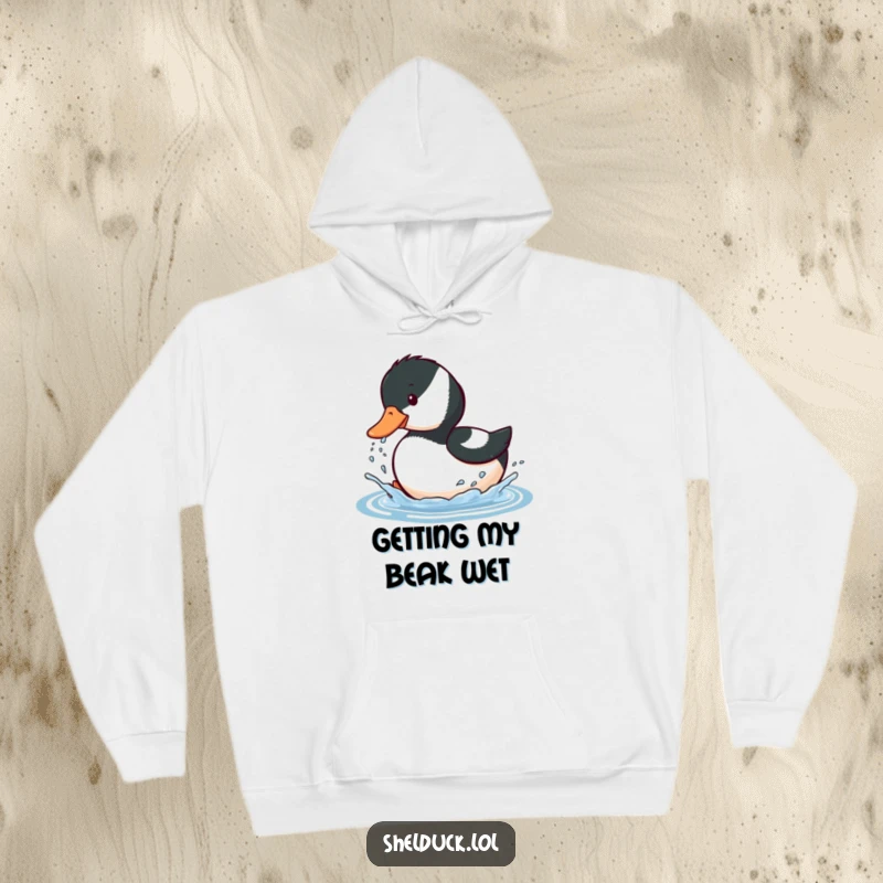 Funny hoodie featuring a shelduck bird energetically splashing water with its beak, offering cozy fun and playful vibes.