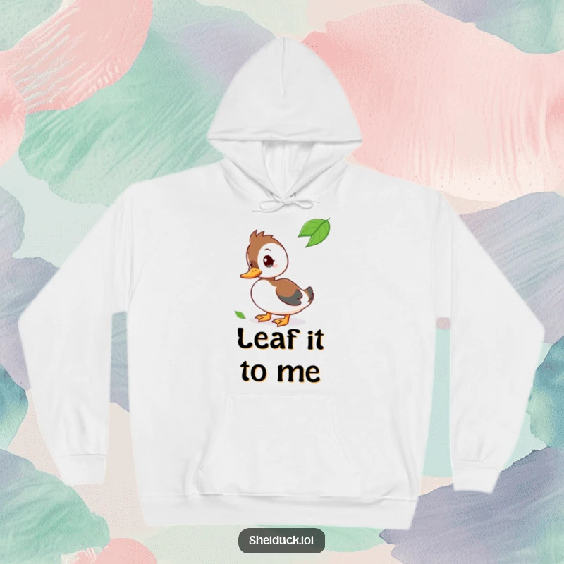 Funny Hoodie graphic of a shelduck bird with its head tilted, curiously observing a floating leaf.