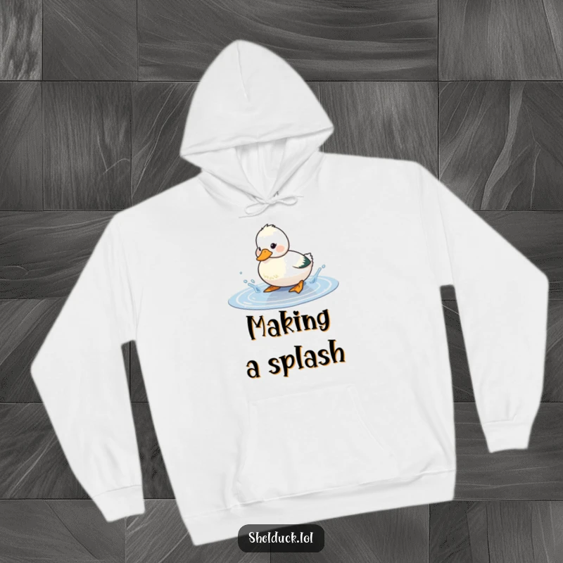 Funny shelduck hoodie featuring a cute bird playfully splashing water in a puddle, perfect for staying warm and cheerful