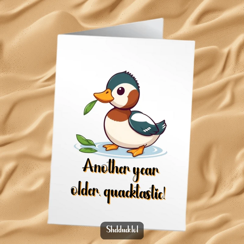 Funny Free Printable Birthday Card: Shelduck tilts head, eyes wide with curiosity at a drifting leaf.
