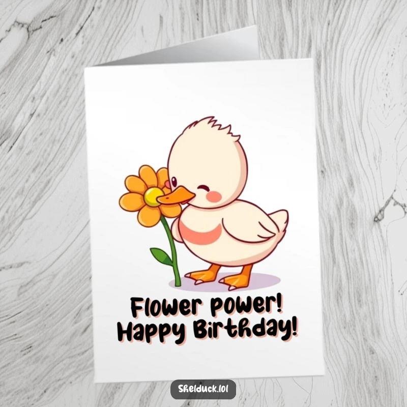 Funny Free Printable Birthday Card: Adorable shelduck playfully pecking at a vibrant flower, spreading cheer.