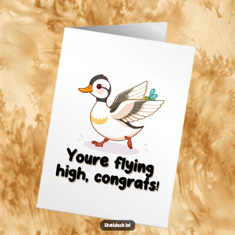 Funny Free Printable Congratulations Card: A joyful shelduck enthusiastically pursuing a shiny dragonfly, celebrating success.