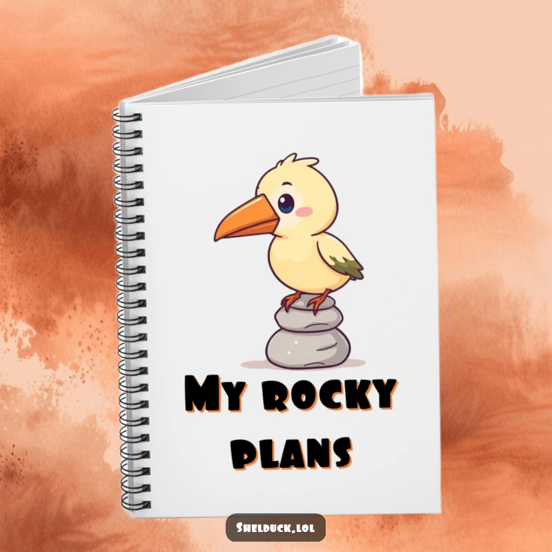 Funny notebook cover showing a stylized bird with an oversized beak humorously balancing a stack of pebbles, inspiring creativity.
