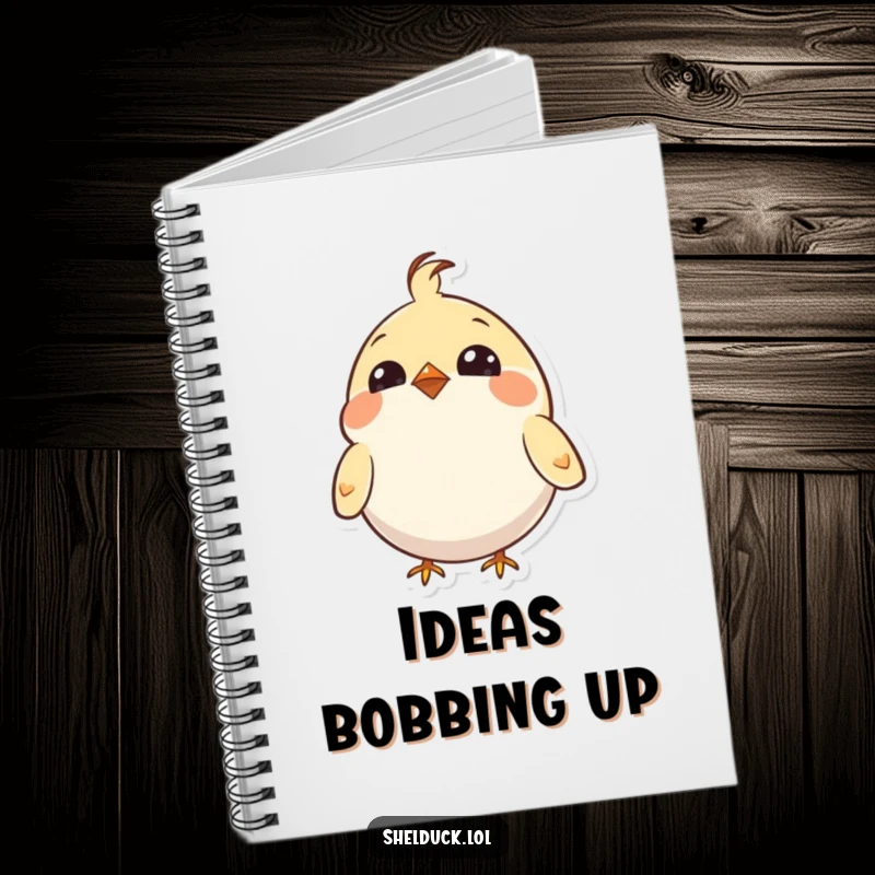 Funny notebook cover with a small, round bird with bright eyes, enthusiastically bobbing its head for inspiration.