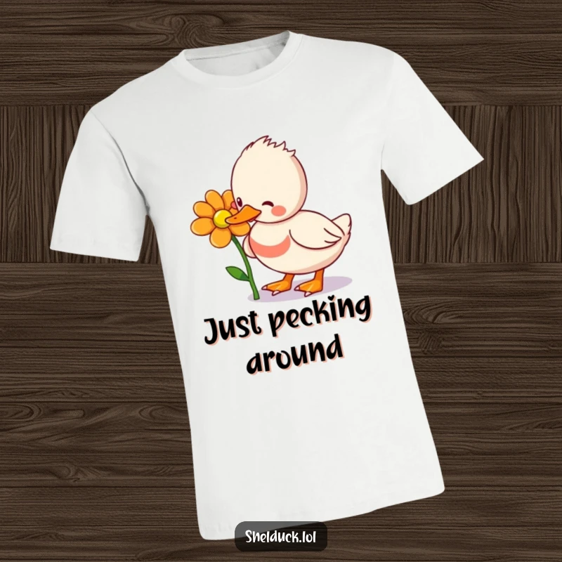 Funny Shelduck T-Shirt: A delightful illustration of a shelduck bird playfully pecking at a bright, eye-catching flower, full of personality.