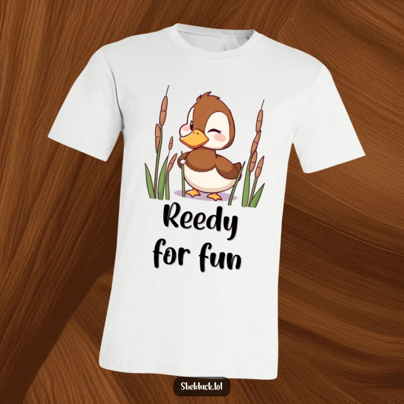 Funny T-Shirt of a playful shelduck character peeking from reeds with a mischievous wink.