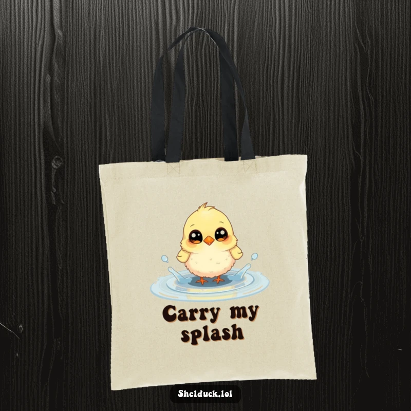 Funny tote bag showcasing a small, fluffy bird with large, curious eyes joyfully splashing in a puddle, ideal for daily use.