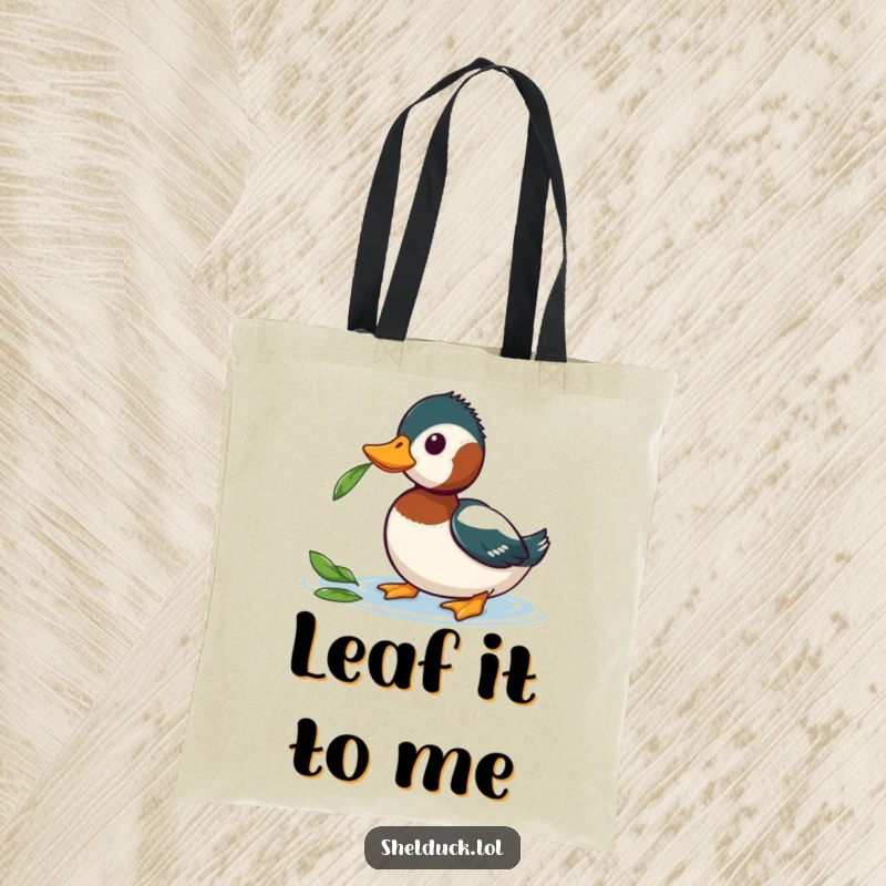 Funny Shelduck Tote Bag showing a shelduck curiously observing a floating leaf, a humorous and practical accessory for daily use.